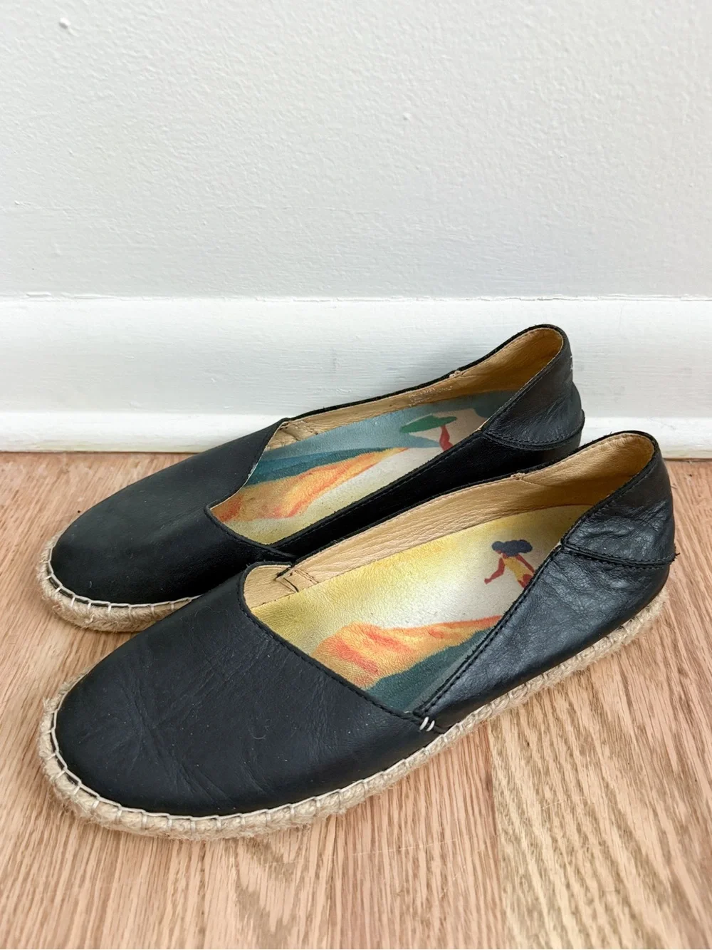 OluKai Kaula Pa'A 'Ili black leather slip-on espadrille flats